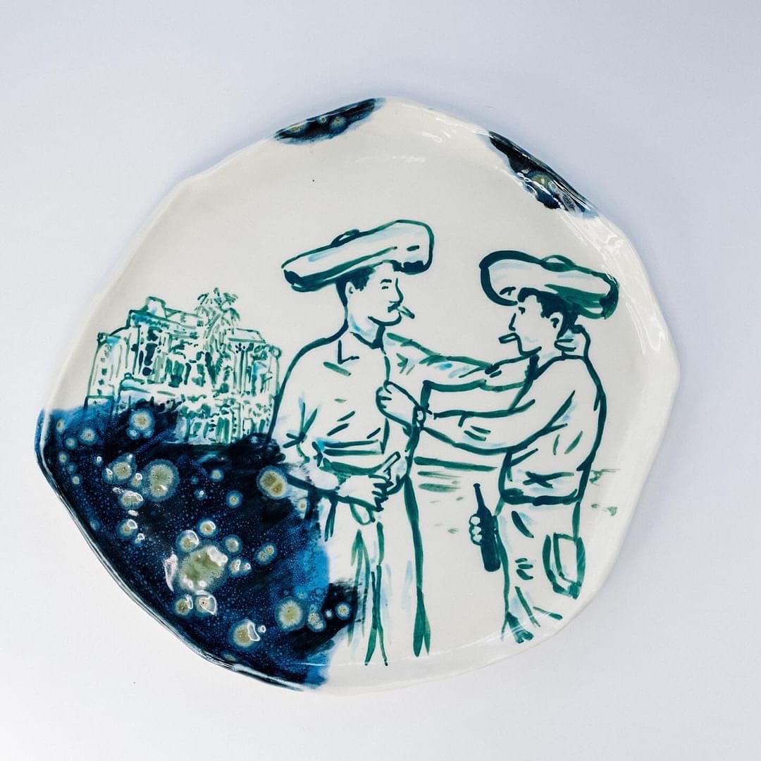 Plate with a picture of two men