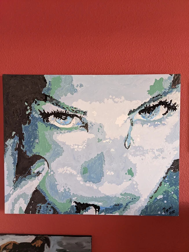 Painting of a crying woman