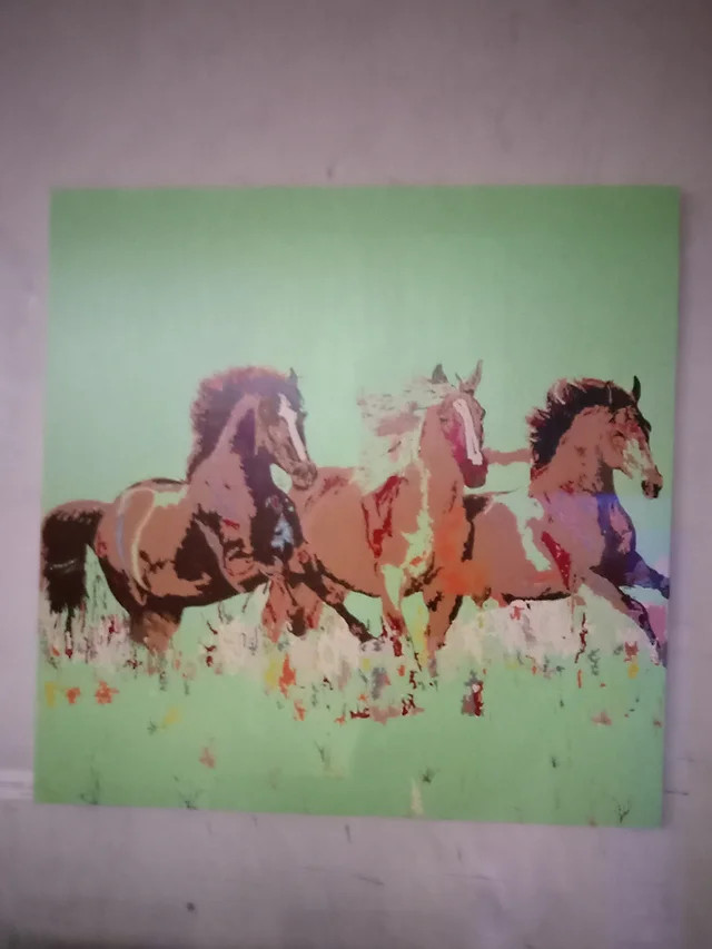 Painting of a wild mustangs run