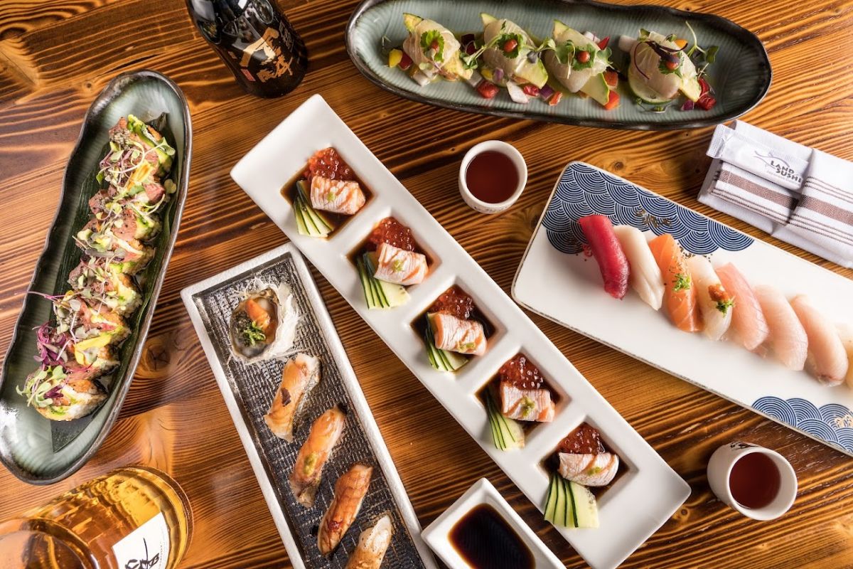 Top view of various sushi dishes on a table