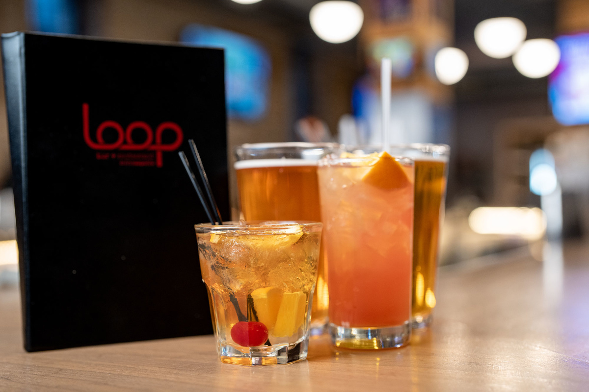 Close-up of various drinks on a bar counter