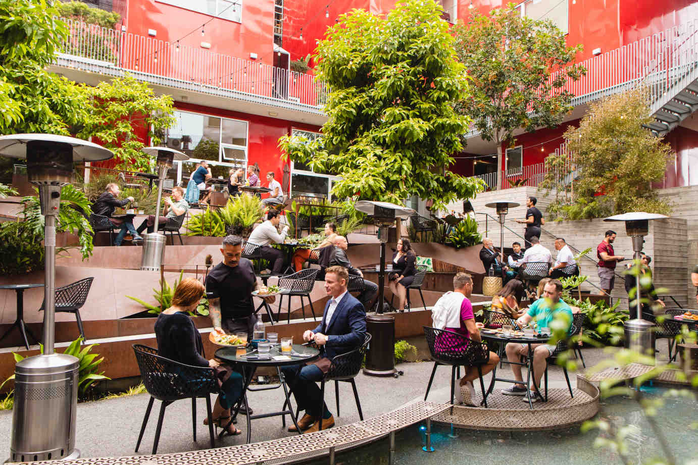 Exterior, people sitting in the garden patio