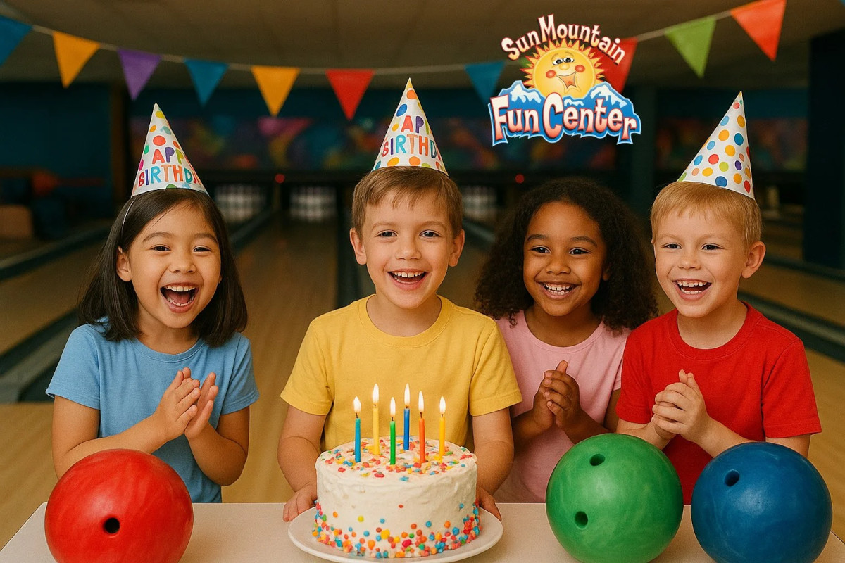 Smiling children gathered around a birthday cake