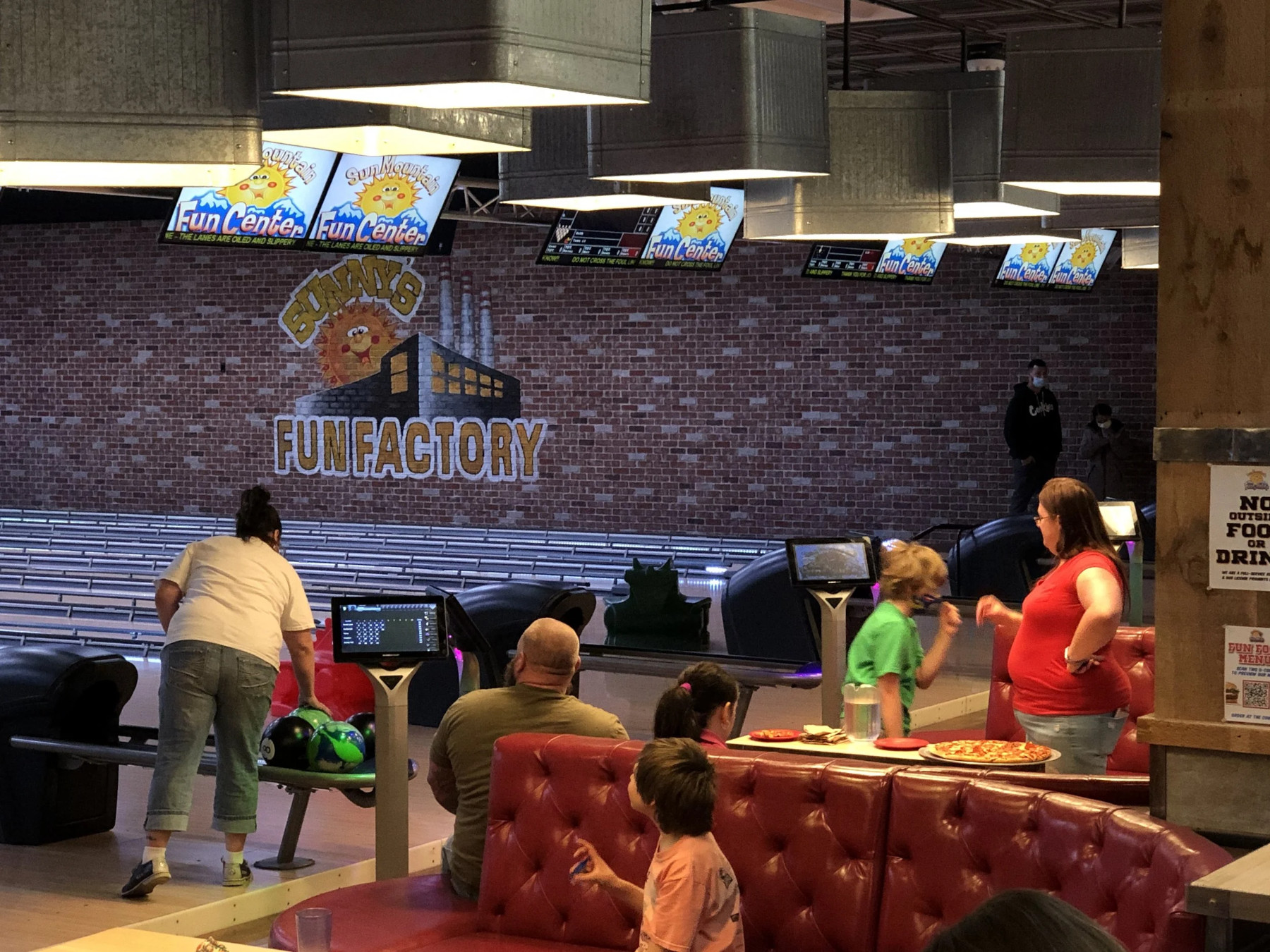 People at the bowling alley