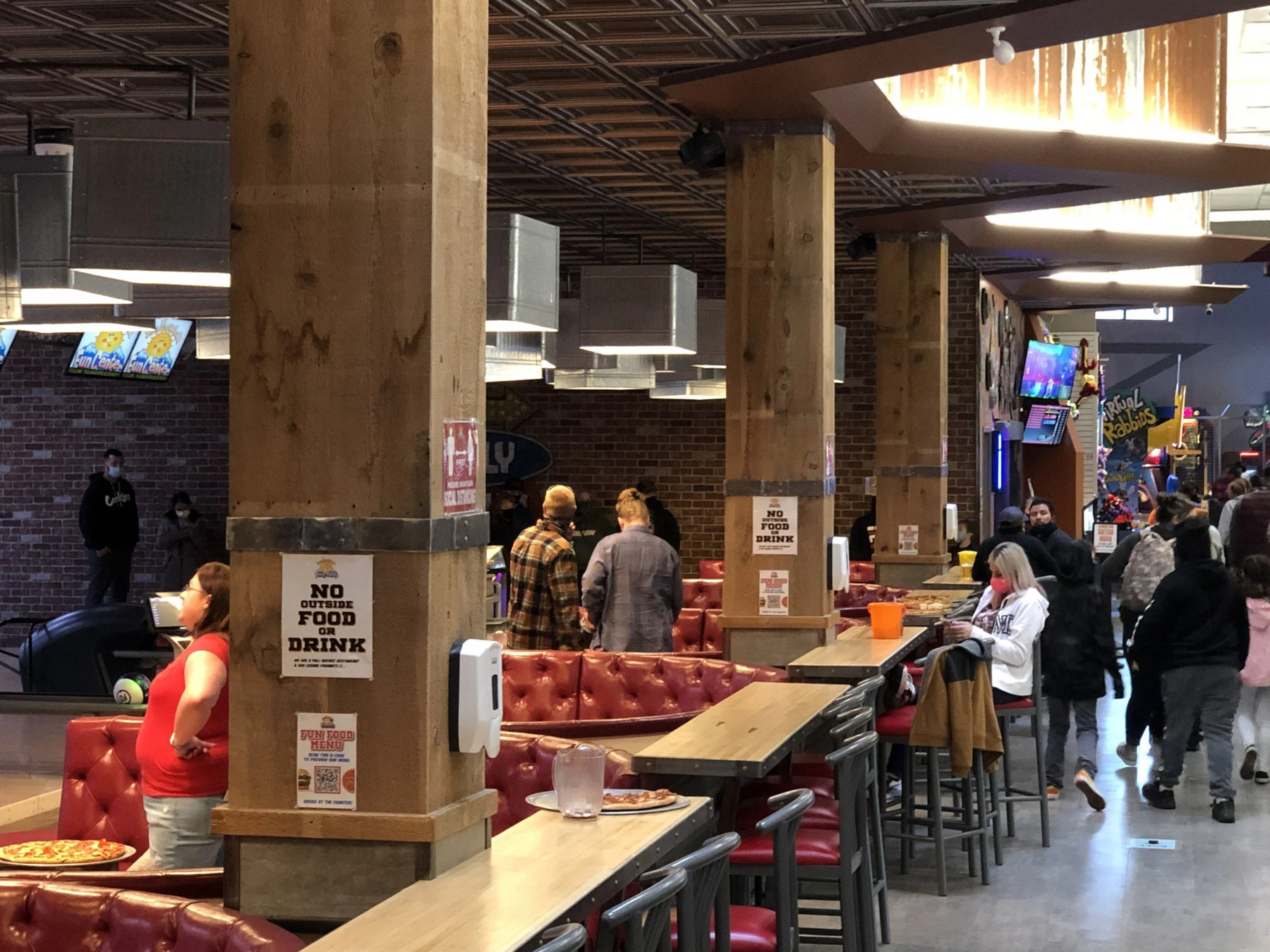 Lots of people at the bowling area