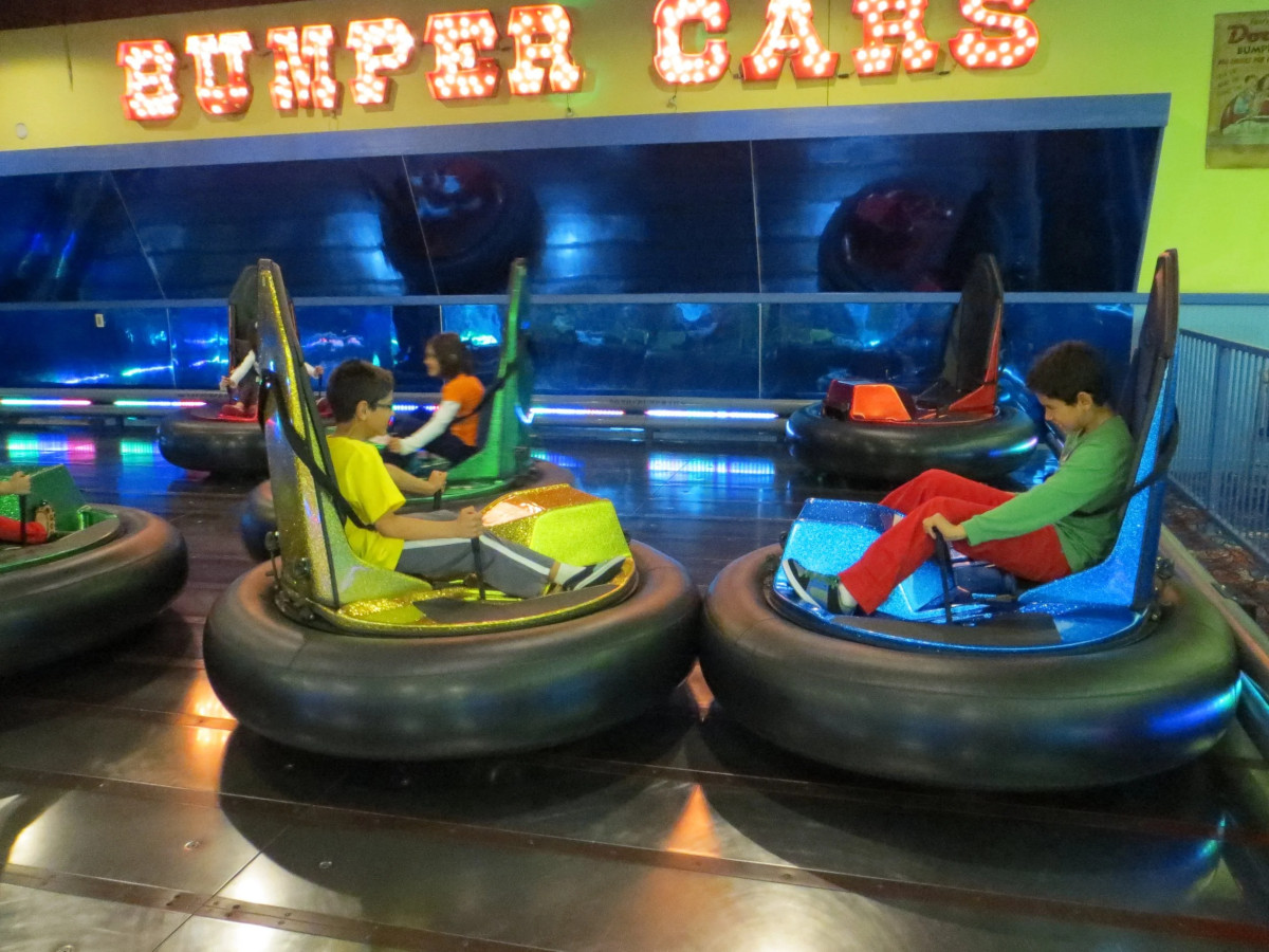 Children driving bumper cars