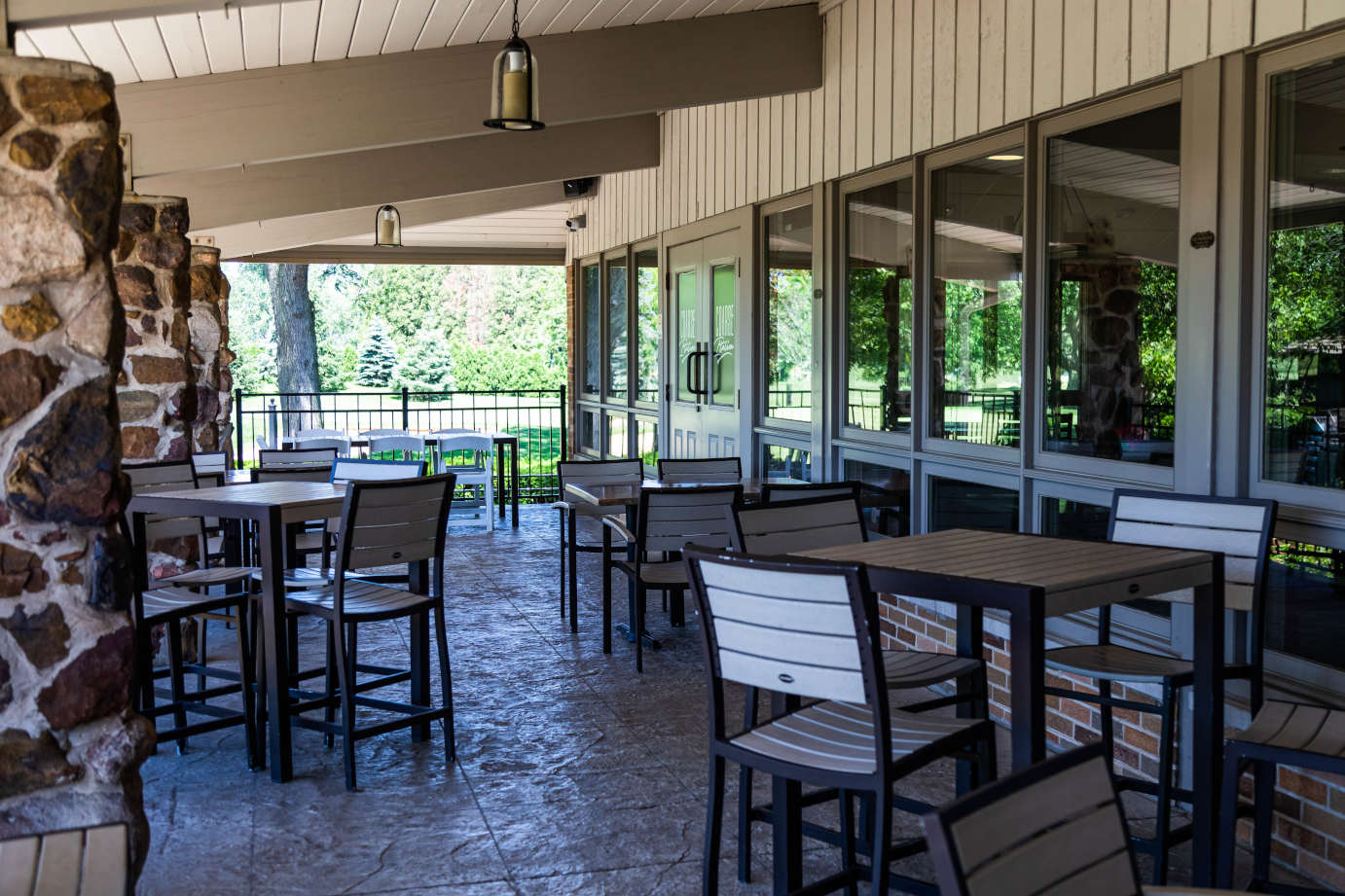 Covered patio area, tables and seats