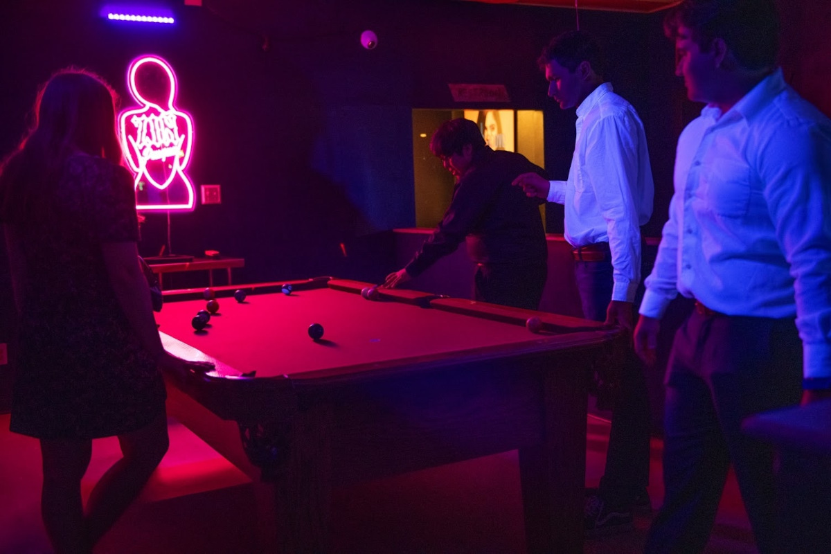 Guests playing pool
