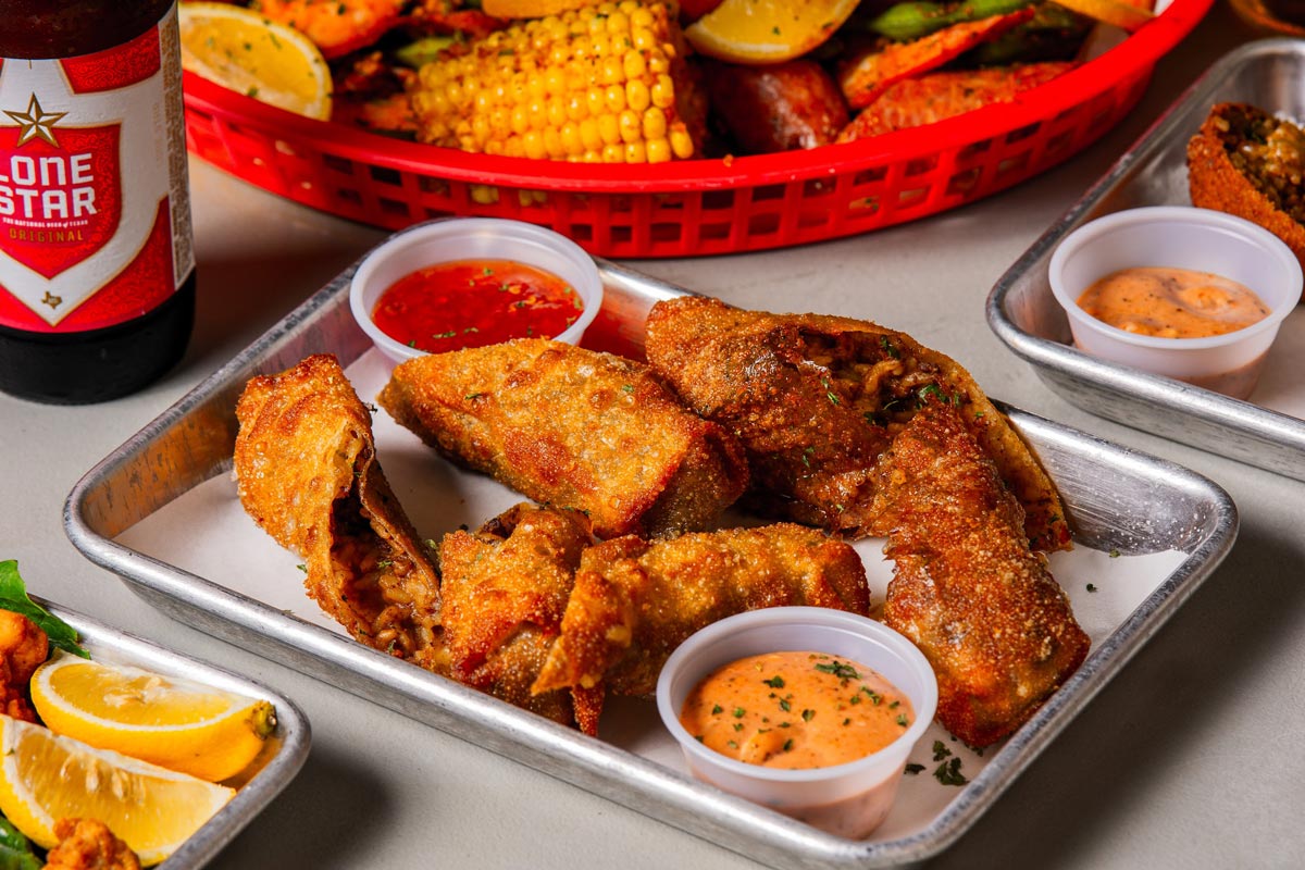 Egg rolls served with dipping sauces