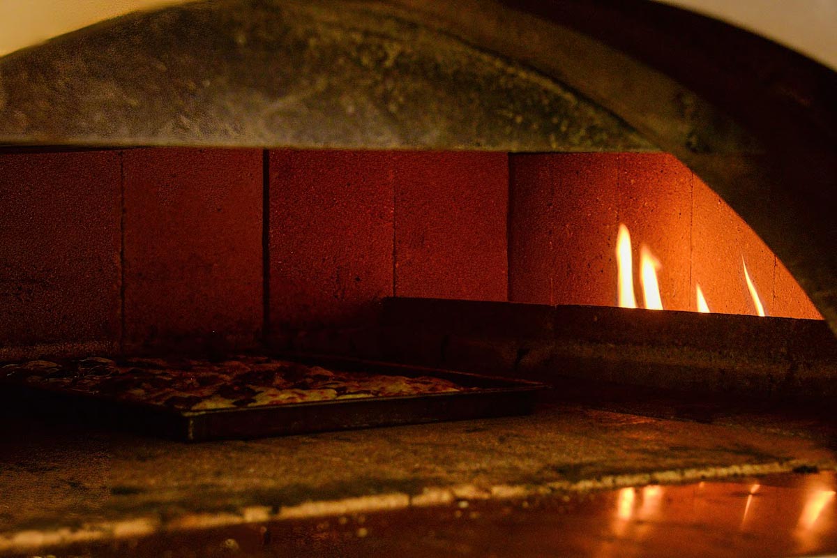Pizza baking in an oven