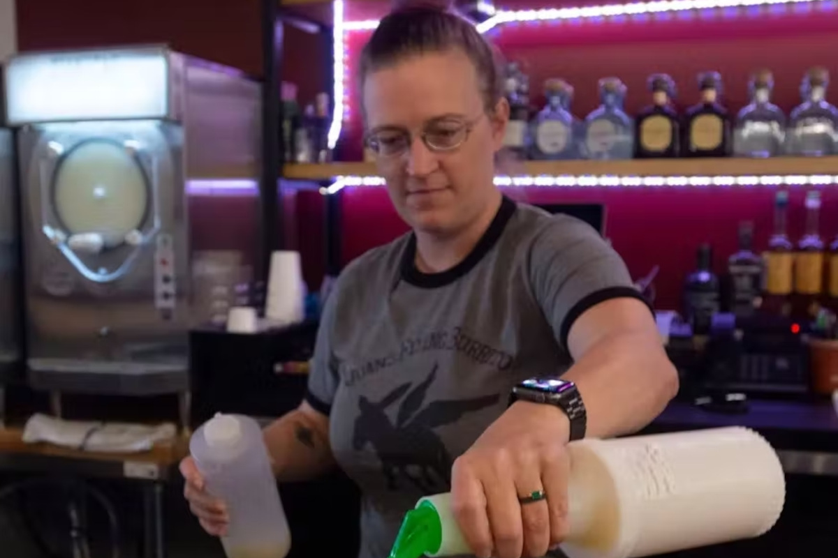 Bartender pouring shots