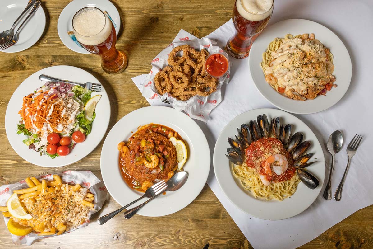Assortment of dishes and beer, top view