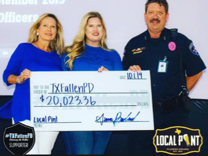 Local Pint team presenting a donation check to Texas Police Chiefs Association officers