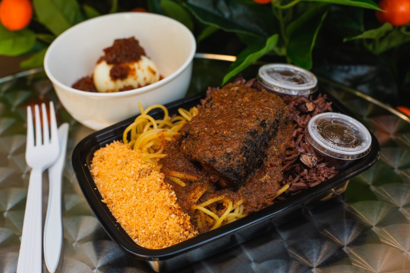 Large dish with meat, pasta and corn