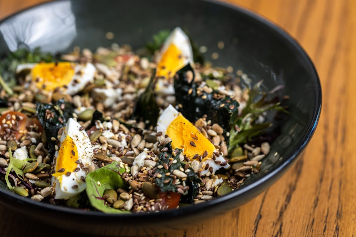 Bird seed salad with greens and boiled egg