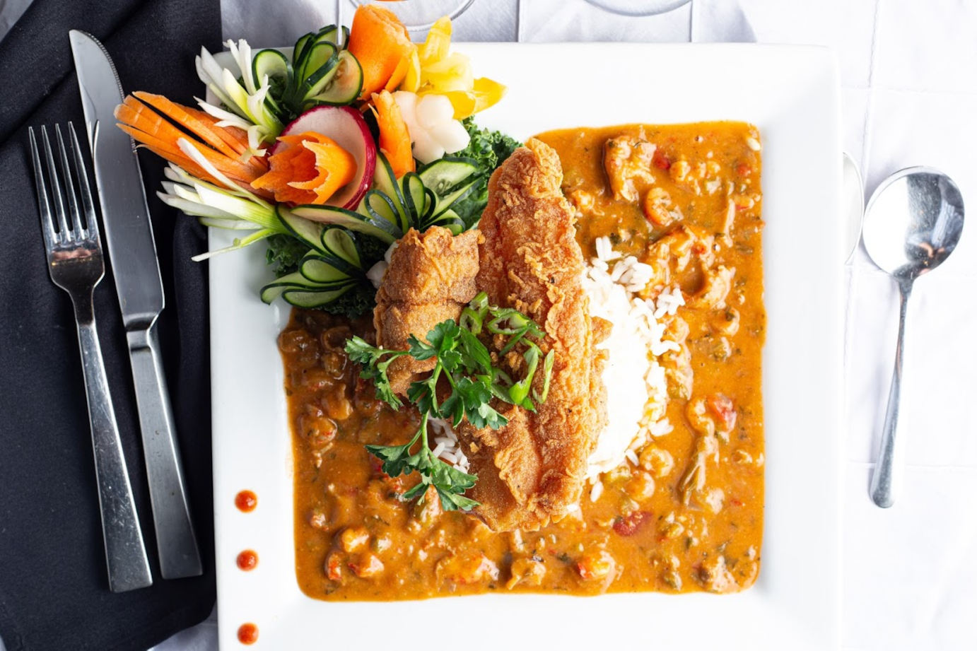 Panned fish with rice and sauce