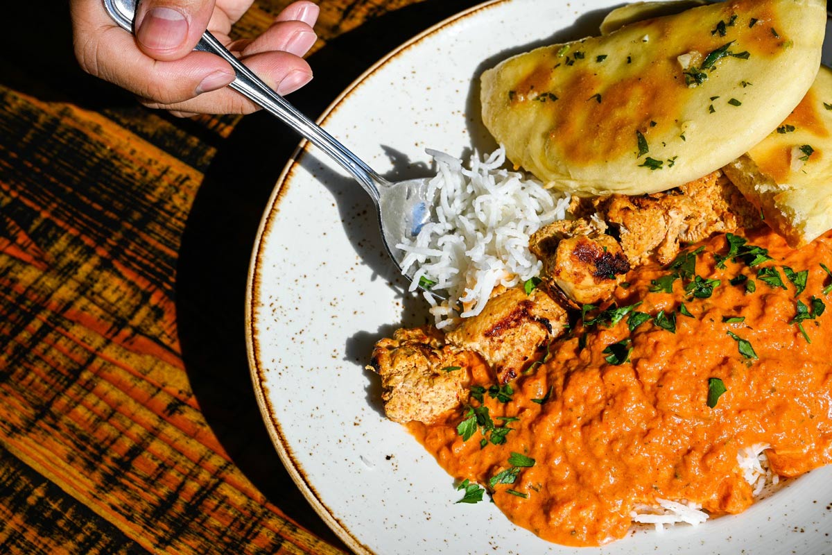 Chicken tikka masala, served with bread