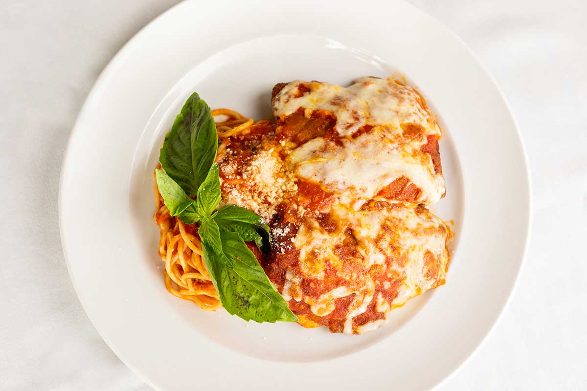 Chicken Parmesan over spaghetti, top view