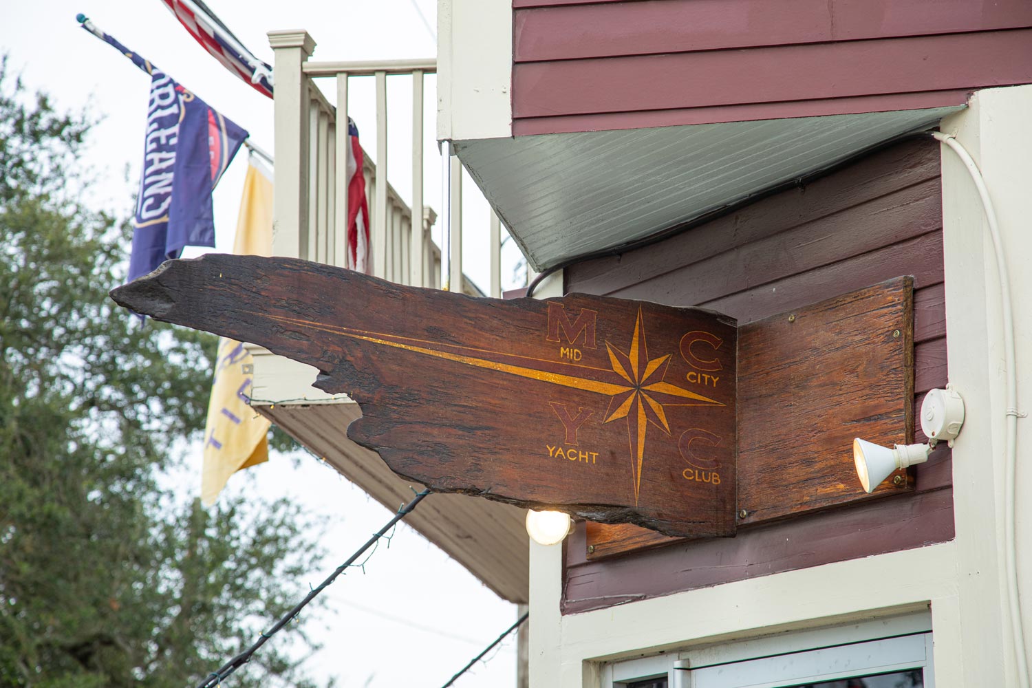 Exterior, a wooden restaurant sign