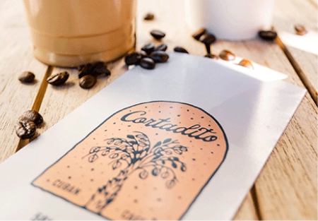 Coffee and menu on a table