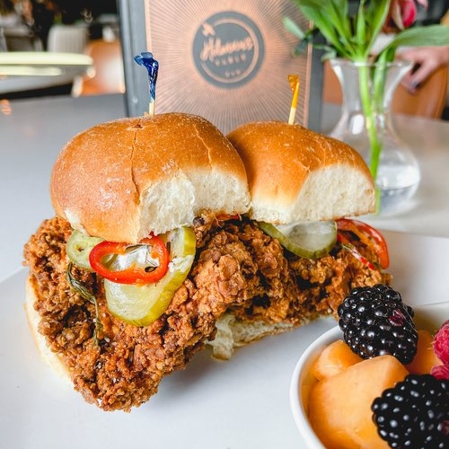 Fried chicken sandwich with fresh fruits
