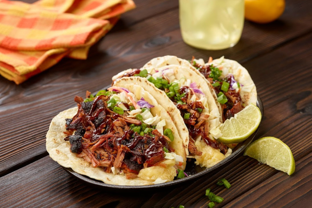 Three tacos on the plate