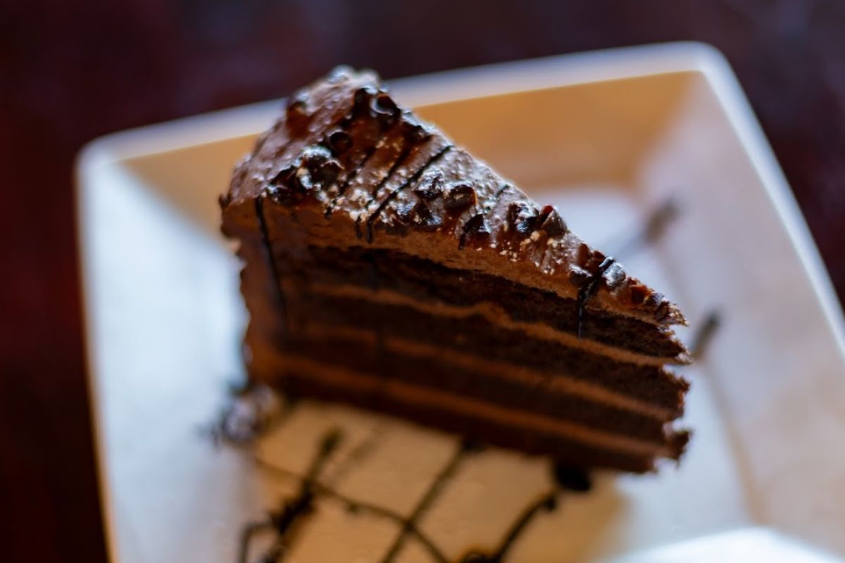 Chocolate Cake: Our decadent chocolate cake is filled and topped with creamy fudge frosting.