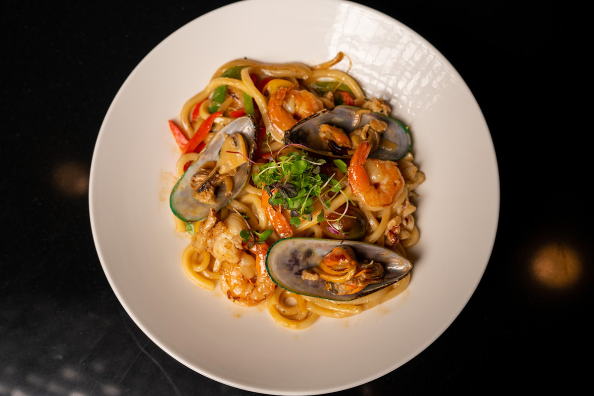 Dish of seafood with noodles