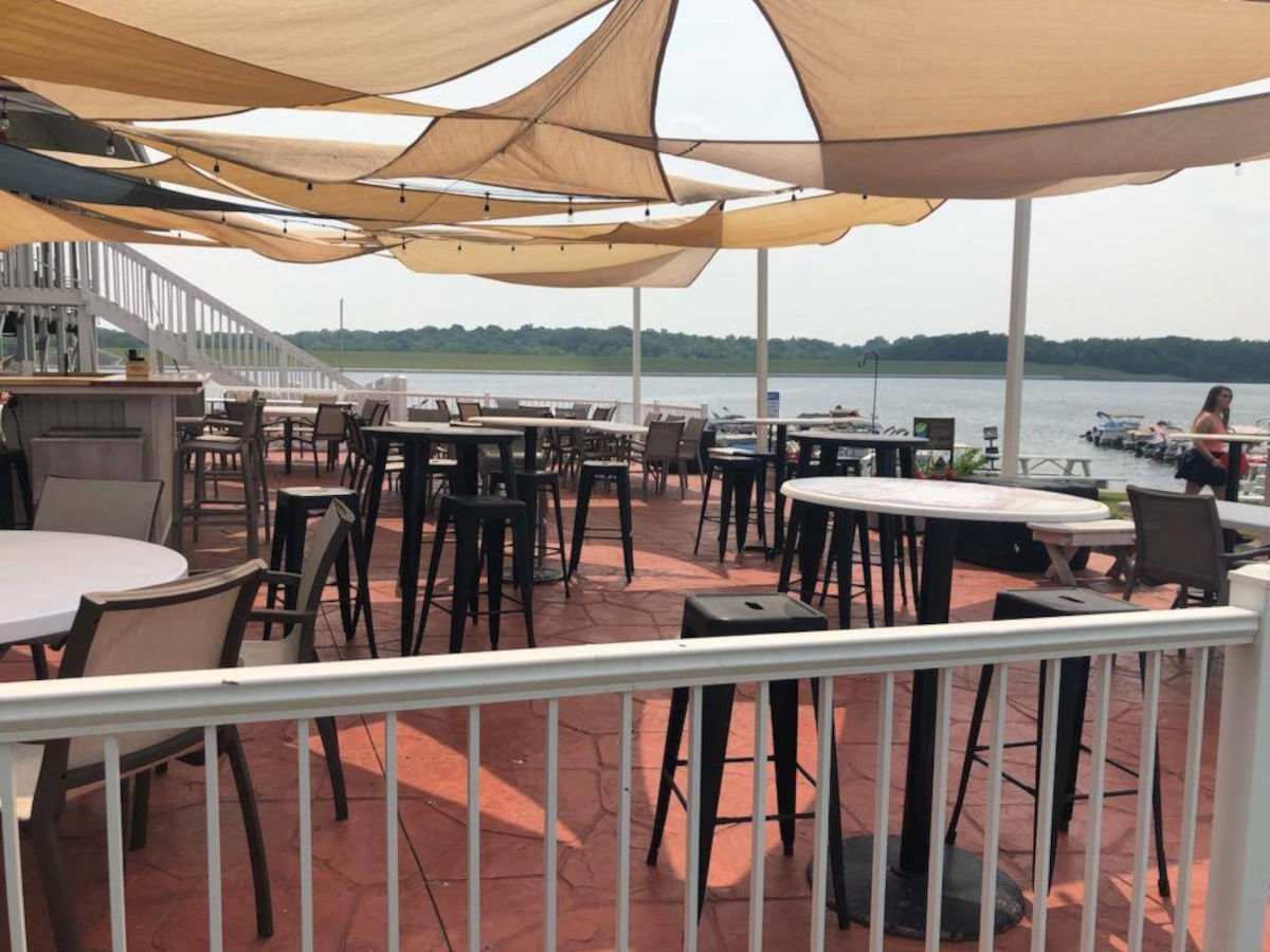 Restaurant terrace with tables and chairs