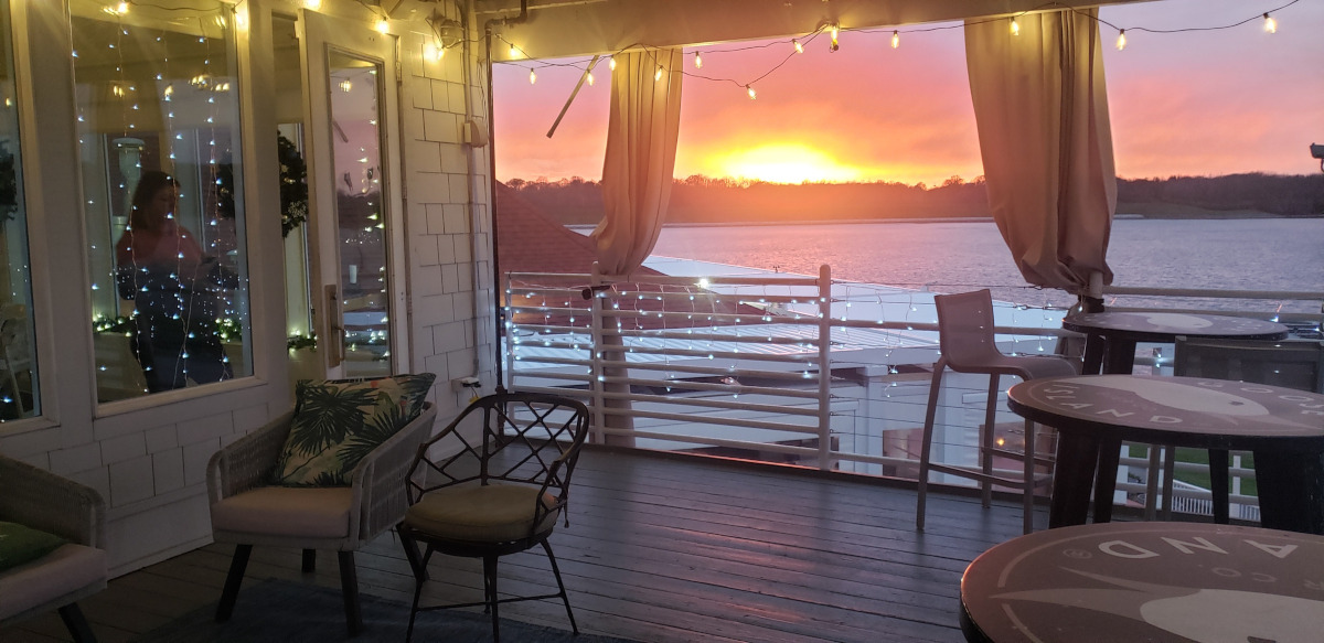 Restaurant terrace with a view of the sunset