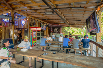 Exterior, seating space outside the bar with guests