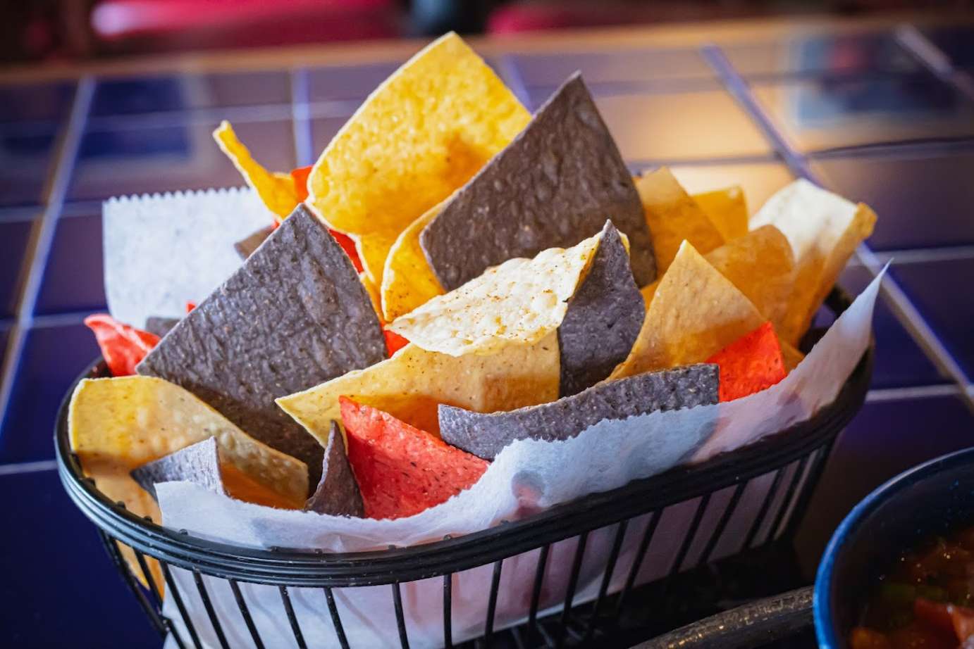 Basket of multi-colored tortilla chips