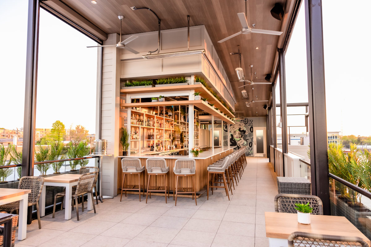Exterior, rooftop bar area, bar stools, tables and chairs