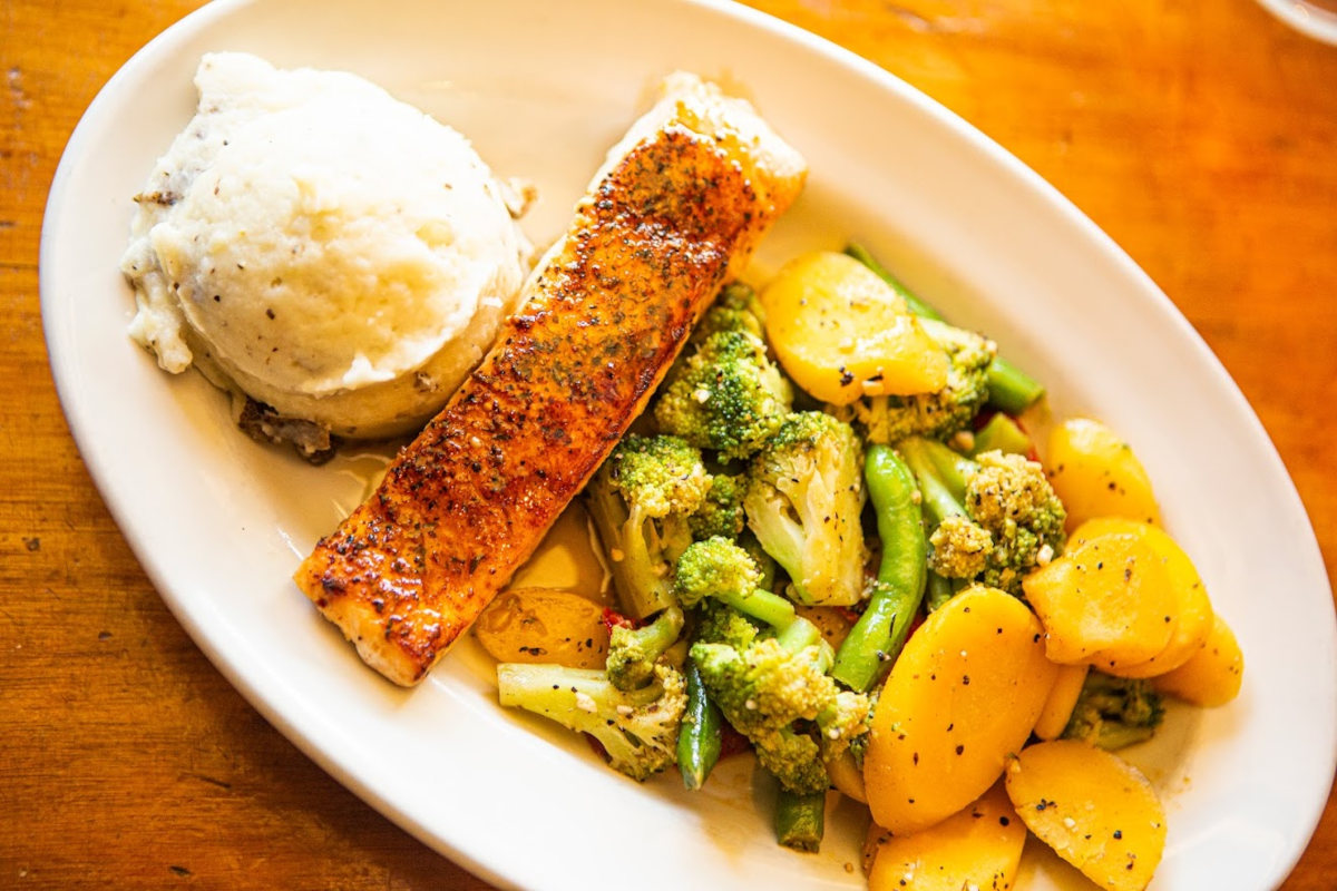 Salmon, vegetables on the side