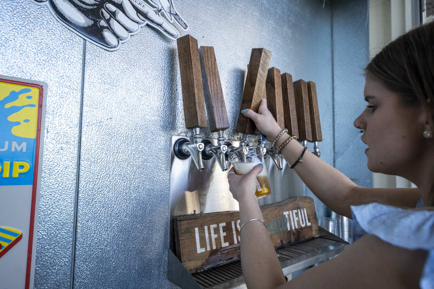 Pouring craft beer on tap