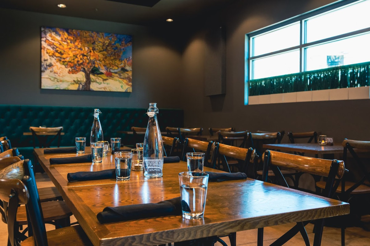Interior, dining tables ready for guests