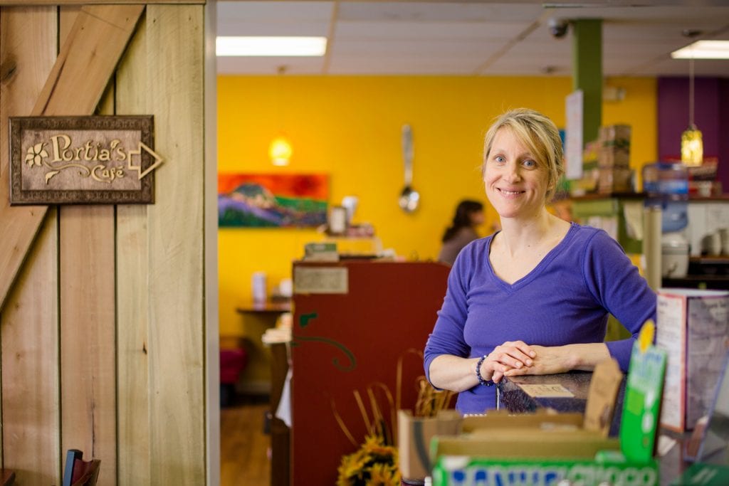 Portia Yiamouyiannis standing at the store